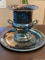 Bucket on tray showing overall design and finish