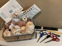 Overall lot showing bandages, brace, dressings, grooming tools
