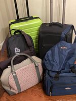 Group view of all seven bags showing size and styles