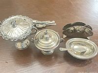 Front view of all main pieces lined up on table