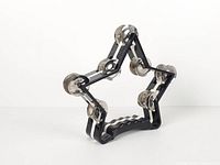 Front view showing star shape and jingles