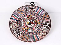Full view of hand-painted terracotta plate