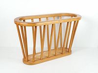 Front angled view showing oval frame and dowel construction