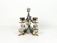 Front view of silver-plated Christmas tree candle holder with six cups