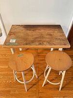 table and two stools front view