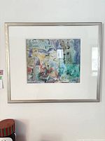 Full view of framed artwork showing mat, frame, and overall appearance