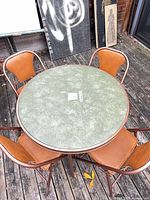 overhead view of table with four chairs assembled