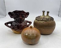 Front view of all three pottery items