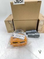 Group of boxed Fur Vac attachments, one sealed attachment, three grey adapters, hex key