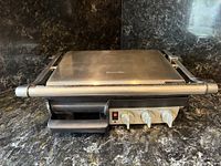 Front view of Breville 800GRXL indoor grill press showing controls and handle
