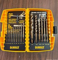 Open case showing full set of drill bits left and right, size markings visible