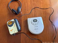 Sony S2 Walkman, Koss CD player and headphones on tabletop