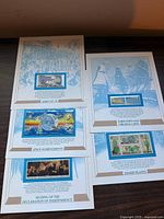 Overview of five USPS panorama panels on table