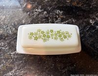 Top view of butter dish showing floral pattern on lid
