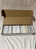 closed cardboard box with cards neatly arranged