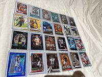 First overview of 20 sleeved rookie cards including Trevor Lawrence Absolute, Najee Harris Blue Prizm, Jalen Waddle Optic, others