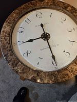 Top view showing marble rim and glass clock dial center