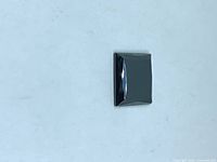 Top view of rectangular hematite cabochon