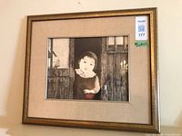 Front view of framed brush and ink artwork