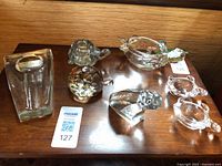 Group shot of all seven glass items on table