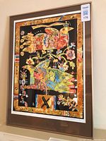 Full view of framed limited edition print in brown frame