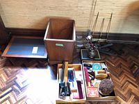 Overall lot view with waste basket, trays, plate stands, office supplies