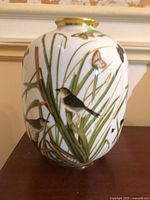 Front view of Rosenthal vase showing bird and reed decoration