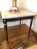 Full view of marble-top end table