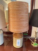 Lamp full view showing base and shade