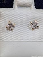 front view of both earrings on display card