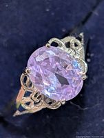 Top view showing oval amethyst and filigree setting