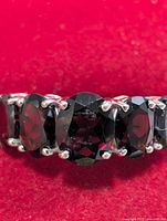 Front view of ring showing center garnet arrangement