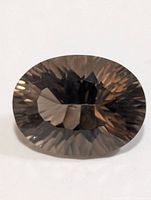 Front view of faceted smoky quartz gemstone