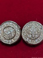 front view of both round CZ stud earrings