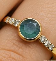 Top view of ring showing alexandrite and diamond accents