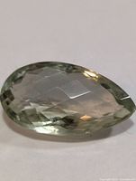 Top view of faceted green amethyst