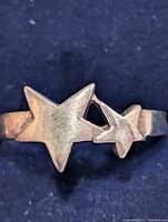 Front view showing twin star design on ring