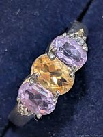 Front view showing amethyst, citrine and accent stones