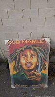 Front view of Bob Marley poster board showing image, text and size