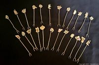 All 24 cocktail picks displayed in fan layout