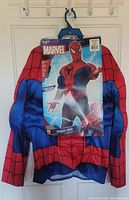 Front view of padded Spider-Man shirt with retail card attached