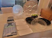 Overview of all serveware, wine glasses and table covers on table