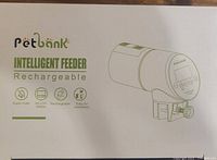 Box showing brand Petbank, model CY-009, illustration of feeder
