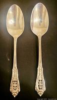Front view of both Wallace Rosepoint teaspoons