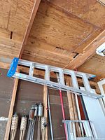 Full view of ladder mounted horizontally on wall