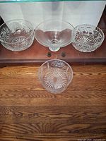 Group view of four bowls showing styles and relative sizes