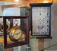 Front view showing both clocks side by side