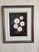 Full view of framed floral painting showing artwork and frame