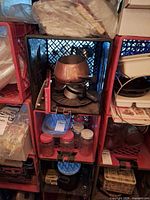 Fondue pot on burner stand with surrounding jars and containers