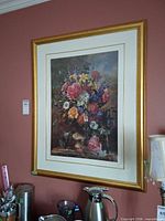 Front view of framed floral print on wall